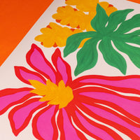 Colorful floral design with pink flower, yellow center, green leaves on an orange background